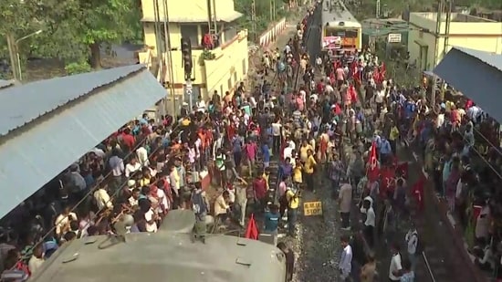 West Bengal | Members from the Left Front gather in huge numbers & block railway tracks at Jadavpur Railway Station in Kolkata, in view of the 2-day nationwide strike called by different trade unions.(ANI)