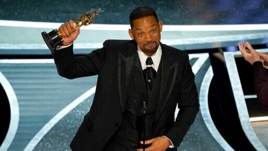 Will Smith accepts the award for best performance by an actor in a leading role for King Richard at the Oscars. (AP)