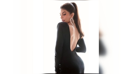 Jacqueline Fernandez flaunts her toned hourglass figure in this chic black designer body-hugging fit.(Instagram/@chandiniw)