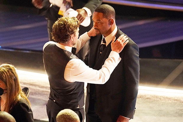 Bradley Cooper talking to Will Smith after the slap incident at Oscars on Sunday night.
