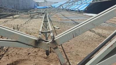 The collapsed iron shed that claimed the lives of two female workers at Rampur Kalan village in Zirakpur on Tuesday. (HT Photo) The collapsed iron shed that claimed the lives of two female workers at Rampur Kalan village in Zirakpur on Tuesday. (HT Photo)