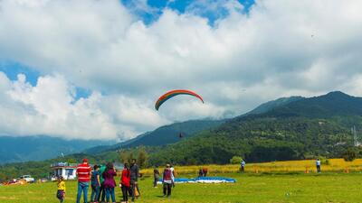 Paragliding at Bir-Billing, one of the best sites in the world for aero sport, was banned on March 8 after two people, a tourist and a local pilot, were killed in a paraglider crash. Facing losses, hoteliers have urged the government to lift the ban on paragliding. (HT Photo)