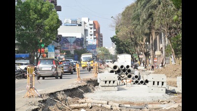 Road construction work at Kokane chowk in Pimple Saudagar is going at snail's pace, causing inconvenience to at least 10,000 residents. (HT PHOTO)