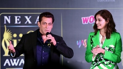 Salman Khan looked dapper in a dark blue tucked in shirt and black pants accessorised with a black belt and shades. (ANI)