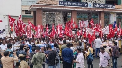 Tamil Nadu: Various trade unions, including the DMK-led trade union Labour Progressive Federation (LPF), participate in the nationwide strike against govt policies for the 2nd & final day. (ANI) Tamil Nadu: Various trade unions, including the DMK-led trade union Labour Progressive Federation (LPF), participate in the nationwide strike against govt policies for the 2nd & final day. (ANI)
