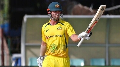 Australia's Travis Head celebrates after completing 50 runs during the first One Day International cricket match between Pakistan and Australia at Gaddafi Stadium in Lahore, Pakistan, Tuesday, March 29, 2022.&nbsp; (AP)