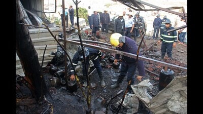 20 LPG cylinders exploded after a fire broke out in a storage shed in Katraj on Tuesday. (Ravindra Joshi/HT PHOTO)
