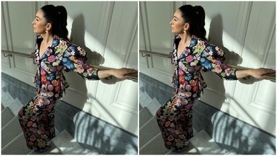 Karisma's ensemble is made from jacquard fabric. Her blazer comes adorned in floral embroidery done in vibrant shades, and features notch lapel collars, raised shoulders, gathered cuffs, quarter length sleeves, front button closures, a fitted silhouette, and a cropped length. (Instagram/@stylebyami) Karisma's ensemble is made from jacquard fabric. Her blazer comes adorned in floral embroidery done in vibrant shades, and features notch lapel collars, raised shoulders, gathered cuffs, quarter length sleeves, front button closures, a fitted silhouette, and a cropped length. (Instagram/@stylebyami)