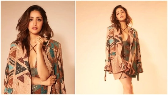 Yami Gautam has kickstarted the promotions of her upcoming social comedy film Dasvi. She is also busking on the success of her last release A Thursday. For a latest promotional event, the actor donned a shimmery printed cut out short dress teamed with a funky matching jacket by designer Nikita Mhaisalkar.(Instagram/@yamigautam)