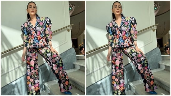 Karisma wore the jacket with matching pants set embroidered with floral patterns. The flared fitting and high waistline lent retro vibes to the star's look. She wore the ensemble with bright blue pointed high heels, patterned gold earrings, and rings.(Instagram/@stylebyami)