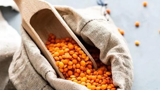 Masoor dal: Pulses, especially masoor dal or red lentils should be consumed more frequently since they are packed in iron, protein and fibre.(Unsplash)