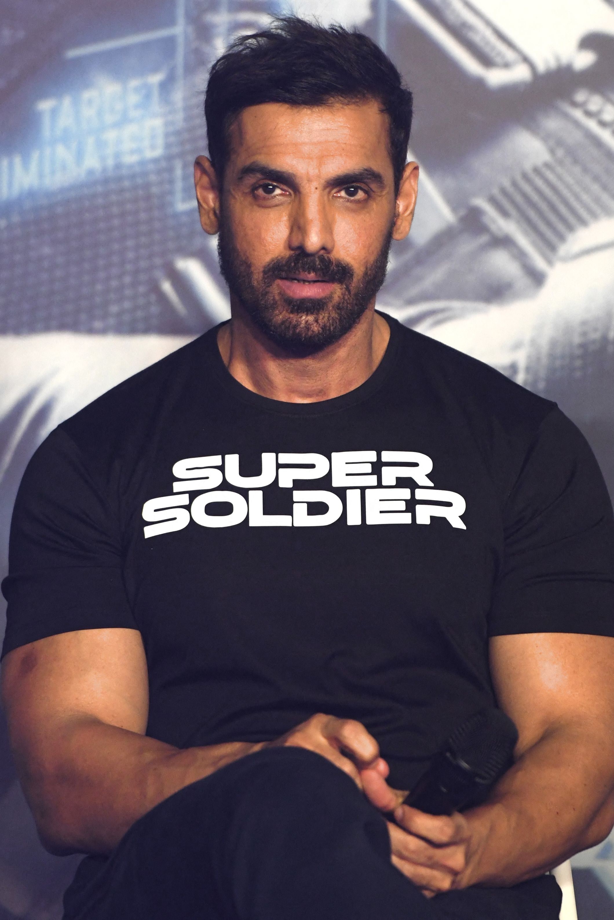 John Abraham poses for pictures during the trailer launch of Attack, earlier in 2022. (AFP) John Abraham poses for pictures during the trailer launch of Attack, earlier in 2022. (AFP)