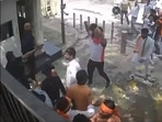 The footage from a CCTV camera installed at the Delhi CM residence shows the protesters dismantling barricades as they huddled outside the house.(Source: AAP Twitter) The footage from a CCTV camera installed at the Delhi CM residence shows the protesters dismantling barricades as they huddled outside the house.(Source: AAP Twitter)