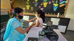 A healthcare worker administers a dose of the Covid-19 vaccine to a student in the age group of 12-14 years, at a school in Vasundhara, in Ghaziabad on Wednesday. (PTI) A healthcare worker administers a dose of the Covid-19 vaccine to a student in the age group of 12-14 years, at a school in Vasundhara, in Ghaziabad on Wednesday. (PTI)