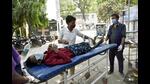Relatives carying a Covid patient for treatment at Patna Medical College & Hospital . (HT Photo) Relatives carying a Covid patient for treatment at Patna Medical College & Hospital . (HT Photo)