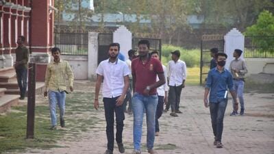 Students emerging from a UP Board exam centre in Prayagraj on Wednesday. Prayagraj is not one of the 24 districts affected by the English question paper leak. (HT Photos) Students emerging from a UP Board exam centre in Prayagraj on Wednesday. Prayagraj is not one of the 24 districts affected by the English question paper leak. (HT Photos)