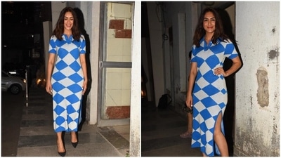 Mrunal Thakur's outfit features diamond patterns spread across the dress, a thigh-high slit and collars with buttons. (HT Photo/Varinder Chawla) Mrunal Thakur's outfit features diamond patterns spread across the dress, a thigh-high slit and collars with buttons. (HT Photo/Varinder Chawla)