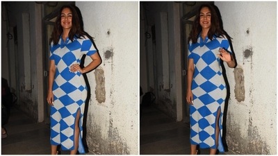 Mrunal Thakur beach waved her hair and teamed her dress with a pair of black pumps. (HT Photo/Varinder Chawla) Mrunal Thakur beach waved her hair and teamed her dress with a pair of black pumps. (HT Photo/Varinder Chawla)