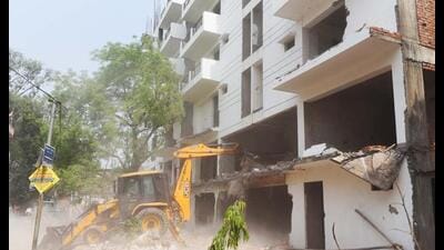 Demolition drive underway on Prag Narain Road in Lucknow on Wednesday. (HT Photo) Demolition drive underway on Prag Narain Road in Lucknow on Wednesday. (HT Photo)