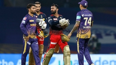 Dinesh Karthik and Harshal Patel of Royal Challengers Bangalore with Kolkata Knight Riders players after winning the match (PTI) Dinesh Karthik and Harshal Patel of Royal Challengers Bangalore with Kolkata Knight Riders players after winning the match (PTI)