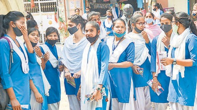 Students leave the exam centre, after the English paper leak, in UP’s Ghaziabad on Wednesday. (PTI) Students leave the exam centre, after the English paper leak, in UP’s Ghaziabad on Wednesday. (PTI)