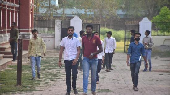 Students emerging from a UP Board exam centre in Prayagraj on Wednesday. Prayagraj is not one of the 24 districts affected by the English question paper leak. (HT Photos)