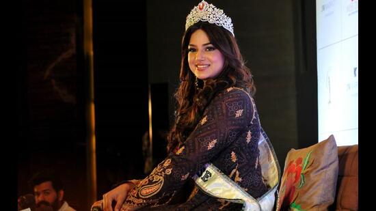 Miss Universe Harnaaz Kaur Sandhu interacting with the media in Chandigarh on Wednesday. (Ravi Kumar/HT)