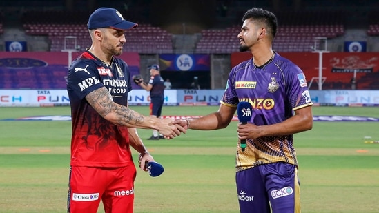 Captain of Royal Challengers Bangalore Faf Du Plessis and captain of Kolkata Knight Riders Shreyas Iyer shake hands during toss(PTI)
