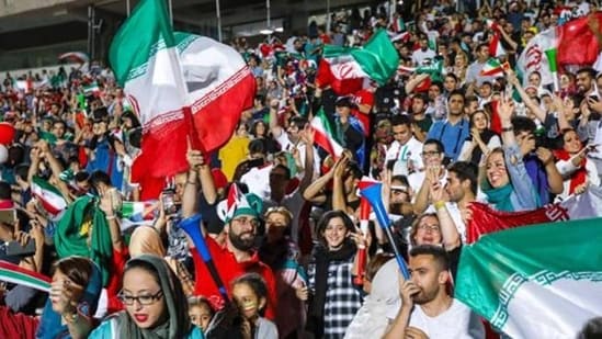 File image- Iranian football supporters wave their national flags.(Getty Images)