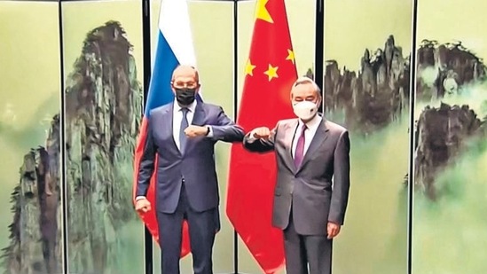 Russian foreign minister Sergei Lavrov (L) with his Chinese counterpart Wang Yi after their meeting in Huangshan in China’s Anhui province on Wednesday. (AFP)