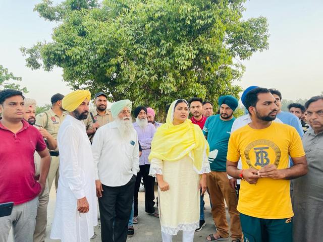 Kharar MLA Anmol Gagan Mann with residents following the raid in Teera village, Mullanpur, on Wednesday. (HT) Kharar MLA Anmol Gagan Mann with residents following the raid in Teera village, Mullanpur, on Wednesday. (HT)
