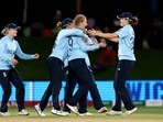 England's Sophie Ecclestone, second right, celebrates with teammates their win over South Africa England's Sophie Ecclestone, second right, celebrates with teammates their win over South Africa