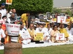 Congress MPs protesting against the hike in diesel and cooking gas prices at Vijay Chowk in New Delhi on Thursday. (Photo by Arvind Yadav)&nbsp;