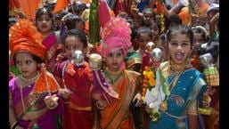 On the occasion of Gudi Padwa on Saturday, students of Mavli Mandal School in Thane wore traditional dresses in Thane on Thursday. The traditional Swagat Yatra returns after a two-year gap on Saturday morning. (PRAFUL GANGURDE/HT PHOTO)