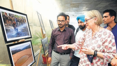 Caraoline Rowett, British deputy high commissioner in Chandigarh, visiting Chandigarh Press Club’s annual photography exhibition on its last day at the Sector 17 underpass on Thursday. (Keshav Singh/HT)