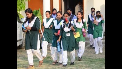 Students coming out after appearing in UP Board exams-2022 from a centre in Prayagraj on Thursday. (HT PHOTO)