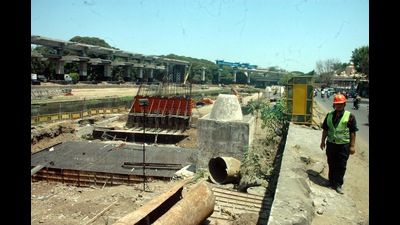 The pillar work of the much awaited Veena-shaped pedestrian bridge that falls near the Mutha river deck has started, and is expected to be complete in eight months (HT PHOTO) The pillar work of the much awaited Veena-shaped pedestrian bridge that falls near the Mutha river deck has started, and is expected to be complete in eight months (HT PHOTO)
