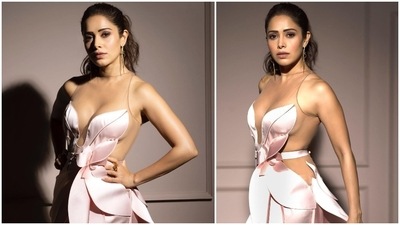 Nushrratt Bharuccha accessorised her red carpet-worthy dress with a small purple bag, statement earrings and rings.Nushrratt Bharuccha wrote the lyrics of Dancing Queen in her caption. It read, "See That Girl.. Watch that Scene.. diggin the Dancing Queen." (Instagram/@nushrrattbharuccha)