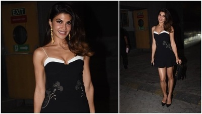 Jacqueline Fernandez teamed her outfit with long gold earrings, black pumps and a medium-size handbag. (HT Photo/Varinder Chawla) Jacqueline Fernandez teamed her outfit with long gold earrings, black pumps and a medium-size handbag. (HT Photo/Varinder Chawla)