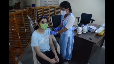 A girl in the 12-15 years age group getting vaccinated against Covid at a Thane Municipal Corporation school in Thane. (PRAFUL GANGURDE/HT PHOTO) A girl in the 12-15 years age group getting vaccinated against Covid at a Thane Municipal Corporation school in Thane. (PRAFUL GANGURDE/HT PHOTO)