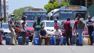 Sri Lankans block traffic as they protest demanding diesel near a gas station in Colombo, Sri Lanka. (AP)