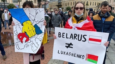 Pro democracy protestors holding a silent peace protest against the Ukraine war in Minsk, Belarus and completely disassociating from their President Alexandar Lukashenko's actions of aiding Russia in the war. Pro democracy protestors holding a silent peace protest against the Ukraine war in Minsk, Belarus and completely disassociating from their President Alexandar Lukashenko's actions of aiding Russia in the war. 