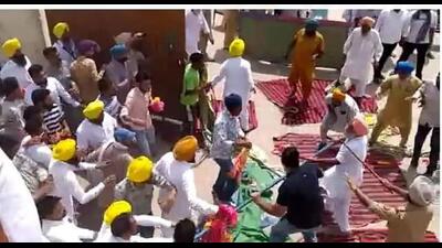 A group of 60 truck operators protesting at the gate locked the door from inside, which escalated t tension among both groups. (HT PHOTO)