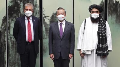 Chinese Foreign Minister Wang Yi (centre) with Pakistan foreign minister Shah Mahmood Qureshi (left) and Taliban-appointed Afghanistan foreign minister Amir Khan Muttaqi during a meeting held in Tunxi district in eastern China’s Anhui province on Wednesday. (AP) Chinese Foreign Minister Wang Yi (centre) with Pakistan foreign minister Shah Mahmood Qureshi (left) and Taliban-appointed Afghanistan foreign minister Amir Khan Muttaqi during a meeting held in Tunxi district in eastern China’s Anhui province on Wednesday. (AP)