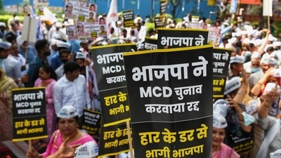 Aam Aadmi Party supporters during a protest against BJP for postponing the Municipal Corporations of Delhi (MCD) elections on March 14. (HT Archive) Aam Aadmi Party supporters during a protest against BJP for postponing the Municipal Corporations of Delhi (MCD) elections on March 14. (HT Archive)