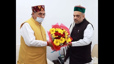 HP minister Suresh Bhardwaj (left) presenting a bouquet to Union home minister Amit Shah in New Delhi on Thursday. (ANI) HP minister Suresh Bhardwaj (left) presenting a bouquet to Union home minister Amit Shah in New Delhi on Thursday. (ANI)