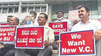 Faculty members and student representatives protested outside Bengaluru University. (TNIE photo) Faculty members and student representatives protested outside Bengaluru University. (TNIE photo)