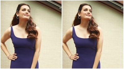 Dia looked adorable in a sleeveless blue dress. The knee-length dress perfectly hugged Dia’s shape and showed off her curves. (Instagram/@diamirzaofficial)
