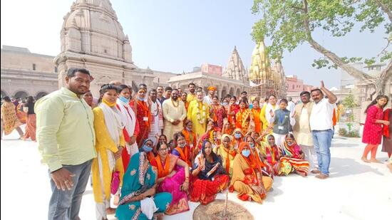 A group of dalit and tribal people at Kashi Vishwanath temple, Varanasi, on Thursday. (HT PHOTO)