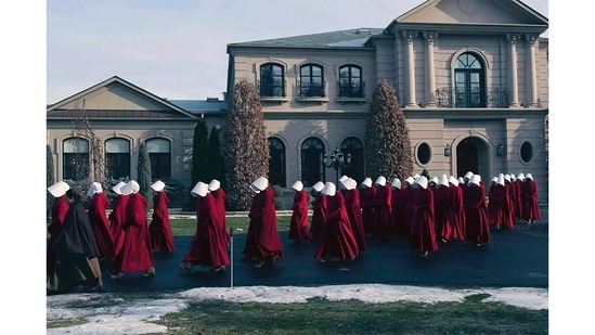 The Handmaid’s Tale (2017) is the kind of future that we didn’t expect – a world that looks largely like our own, no fancy AI or shiny new tech. But with a social system so oppressive, no one but a small group of fundamentalists stand to gain. It’s where we’re headed if we keep supporting extremist ideologies of any kind.&nbsp;(Courtesy Hulu)